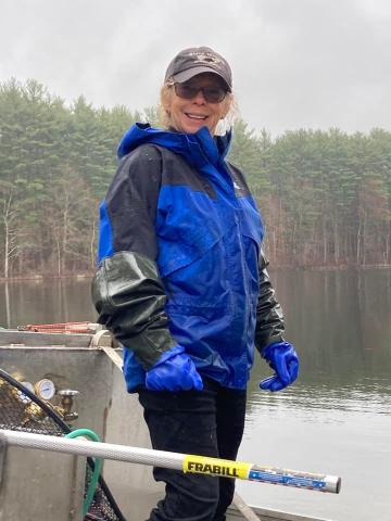 Woman on boat stocking fish