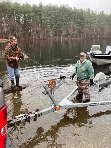 Men launching boat