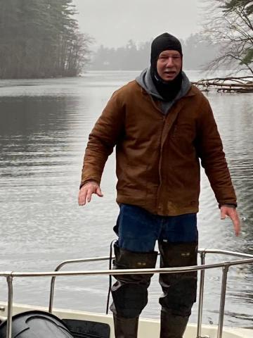 Big man little boat